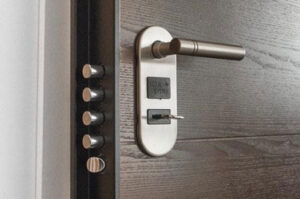 Door handle, keyhole and a deadbolt.